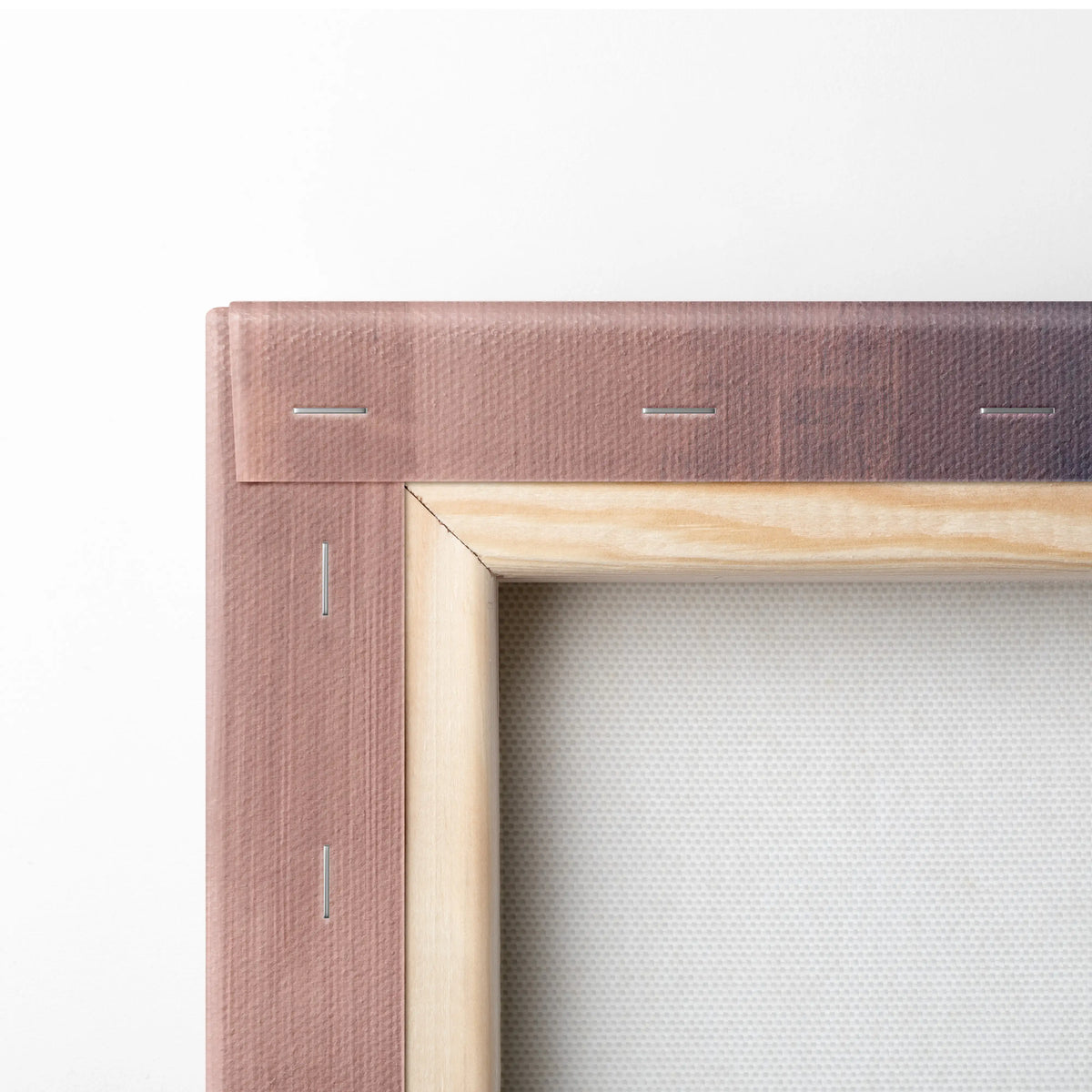 Minimalist canvas art frame with light wood border and textured rose gold fabric backing for Mercedes-AMG GT wall art