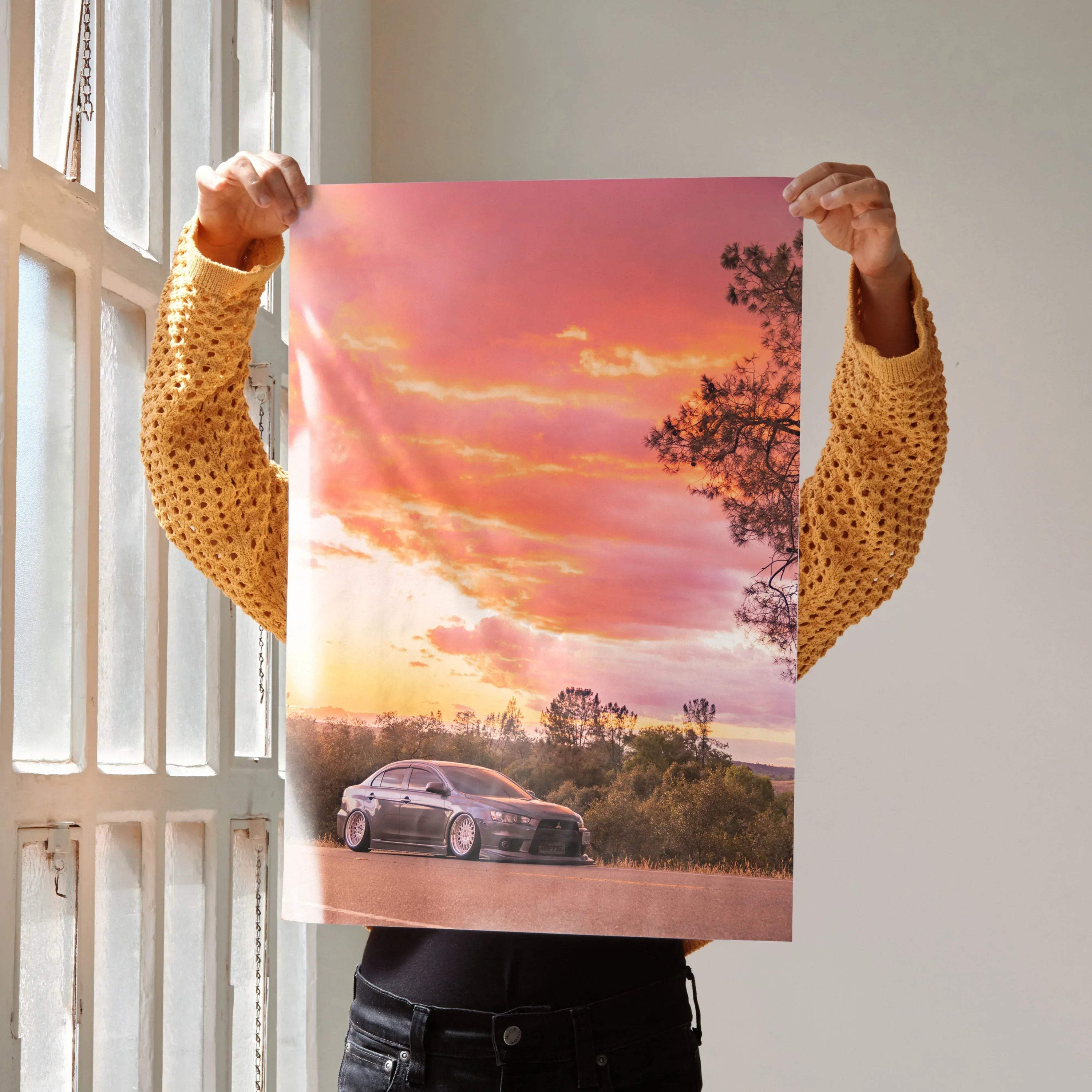 Mitsubishi Evo X poster with sunset sky and nature background, automotive wall art print.