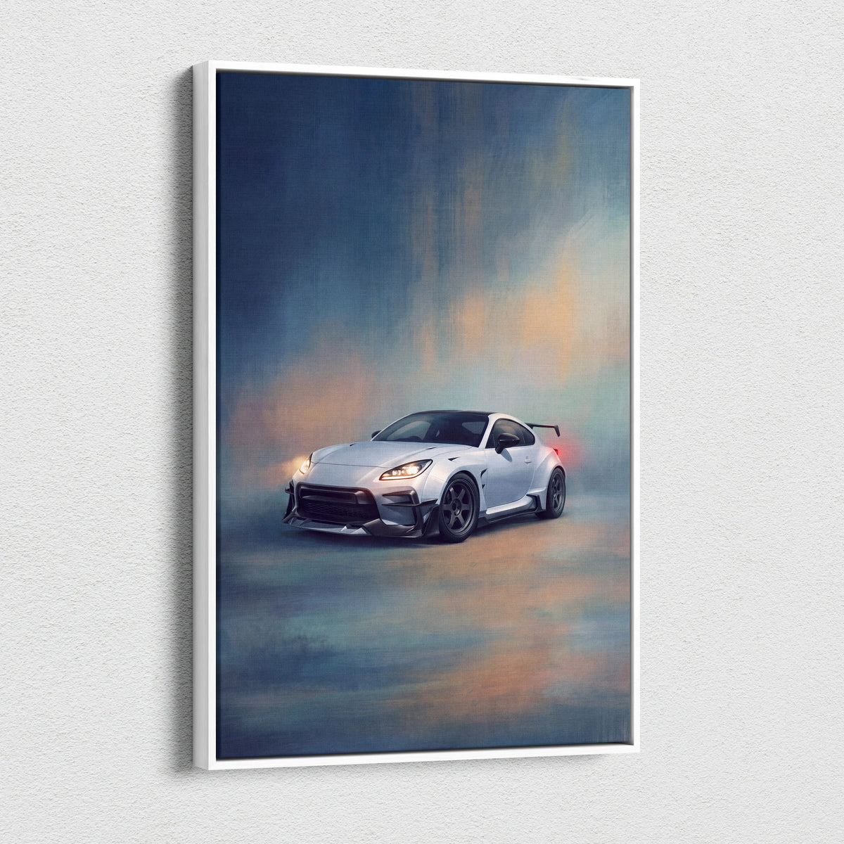 White framed canvas print of a sleek silver toyota gr86 widebody inspired sports car with black accents and glowing headlights