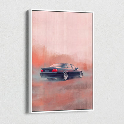 A framed canvas print of a dark blue bmw 5 series sedan drifting on a misty pink road for office wall art