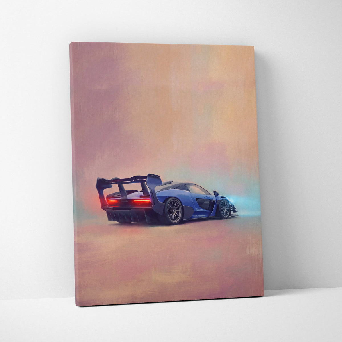 Blue mclaren senna inspired sports car canvas print showing back with glowing red taillights and rear spoiler