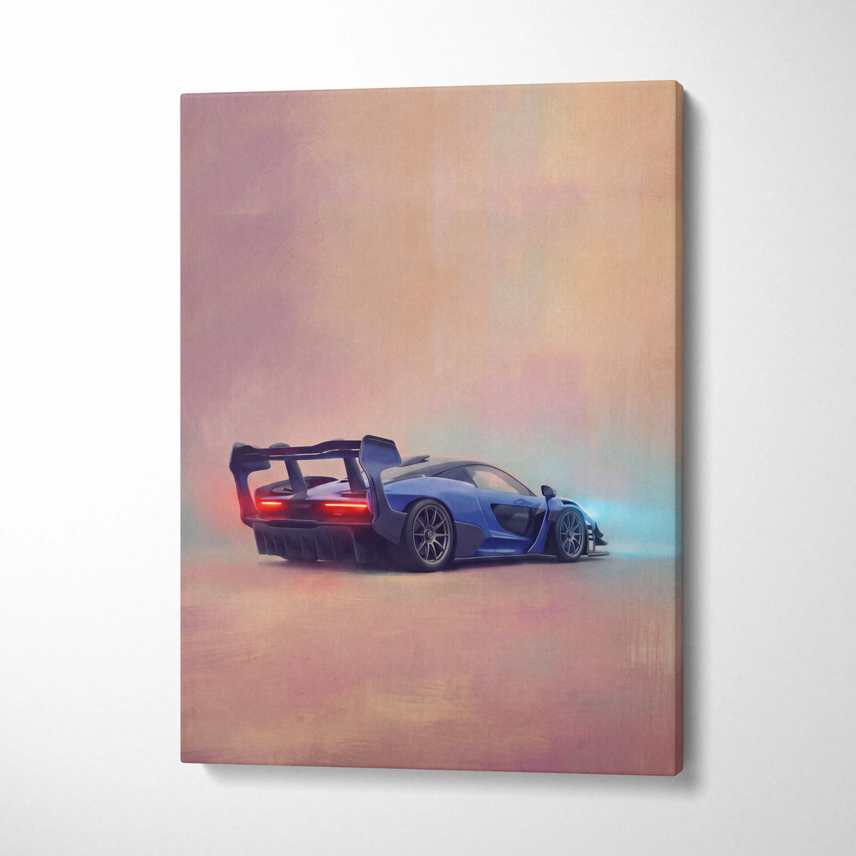 Blue mclaren senna inspired sports car canvas print showing rear with glowing red taillights and rear spoiler