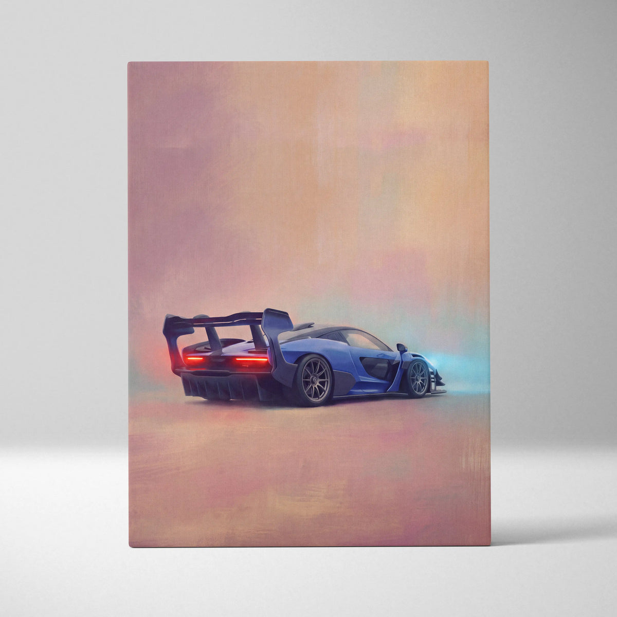 Blue McLaren Senna inspired sports car wall art showing back side with glowing red taillights on luxury canvas print