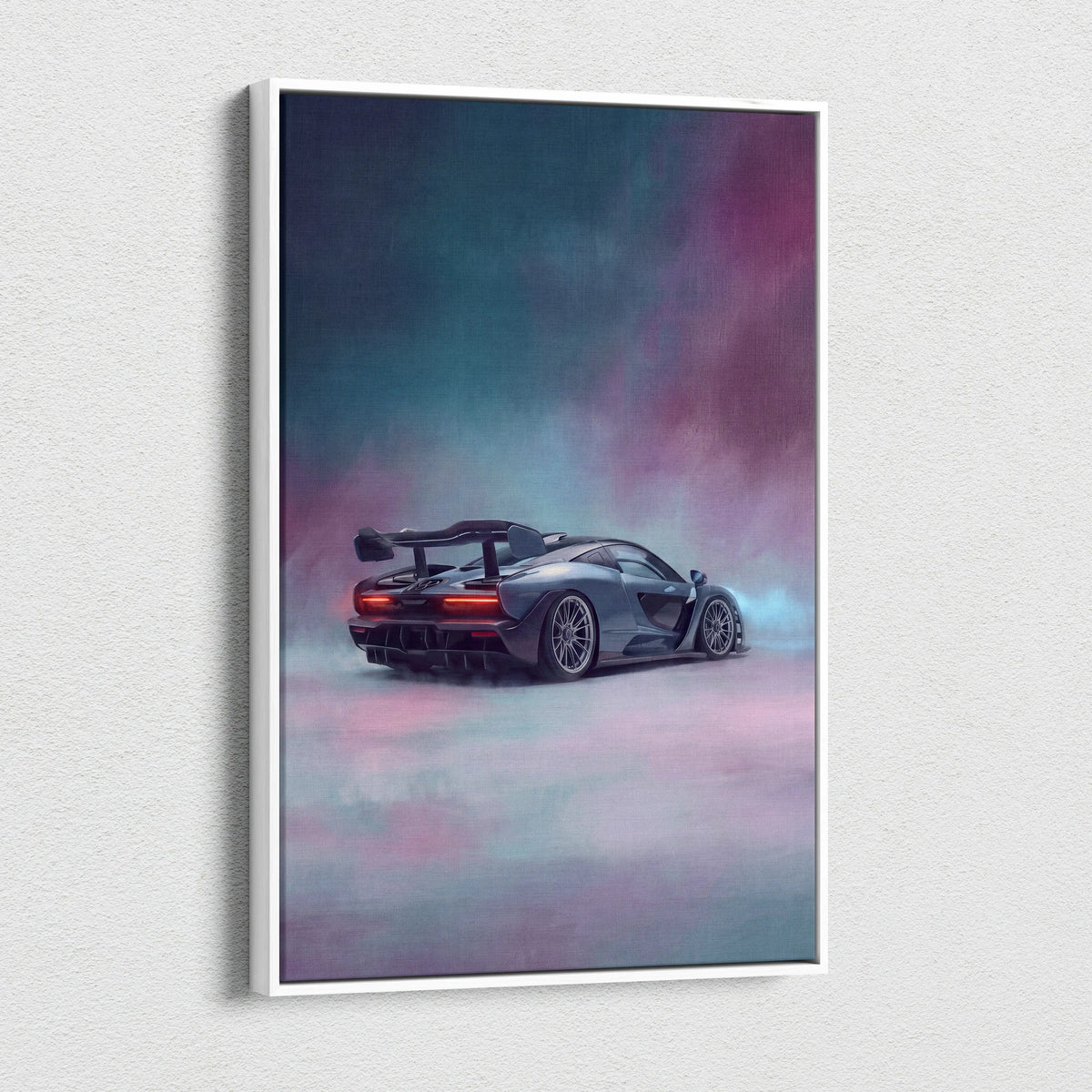 A sleek matte gray mclaren senna inspired supercar with glowing red taillights on a framed canvas wall art print