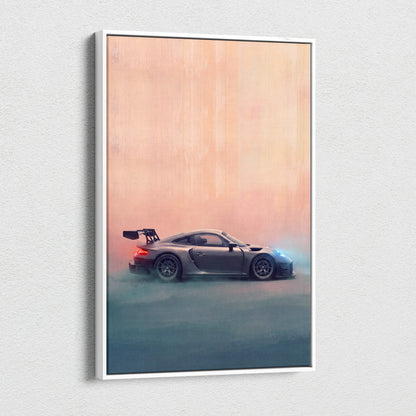 A sleek matte gray Porsche 911 GT3 RS inspired sports car with blue headlights on a minimalist white canvas print