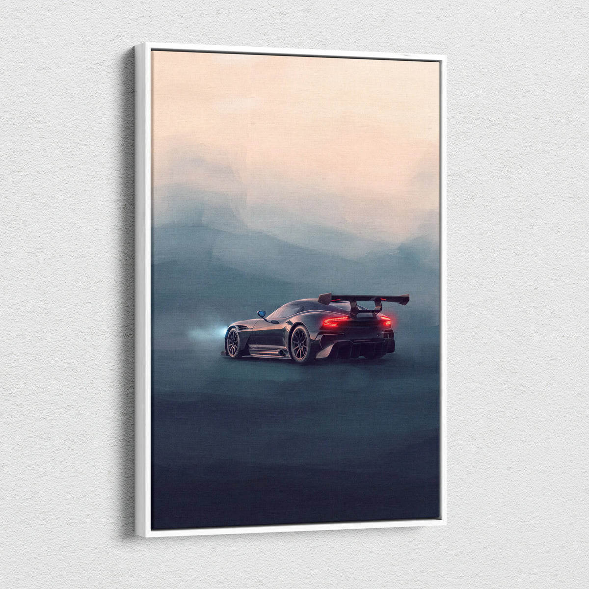 A sleek black aston martin vulcan inspired sports car with glowing red taillights and rear spoiler on canvas print