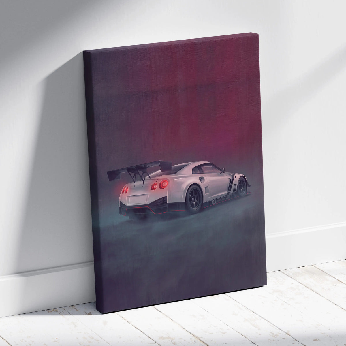 A sleek white Nissan GT-R sports car with black racing stripes and red taillights on a canvas print for garage decor