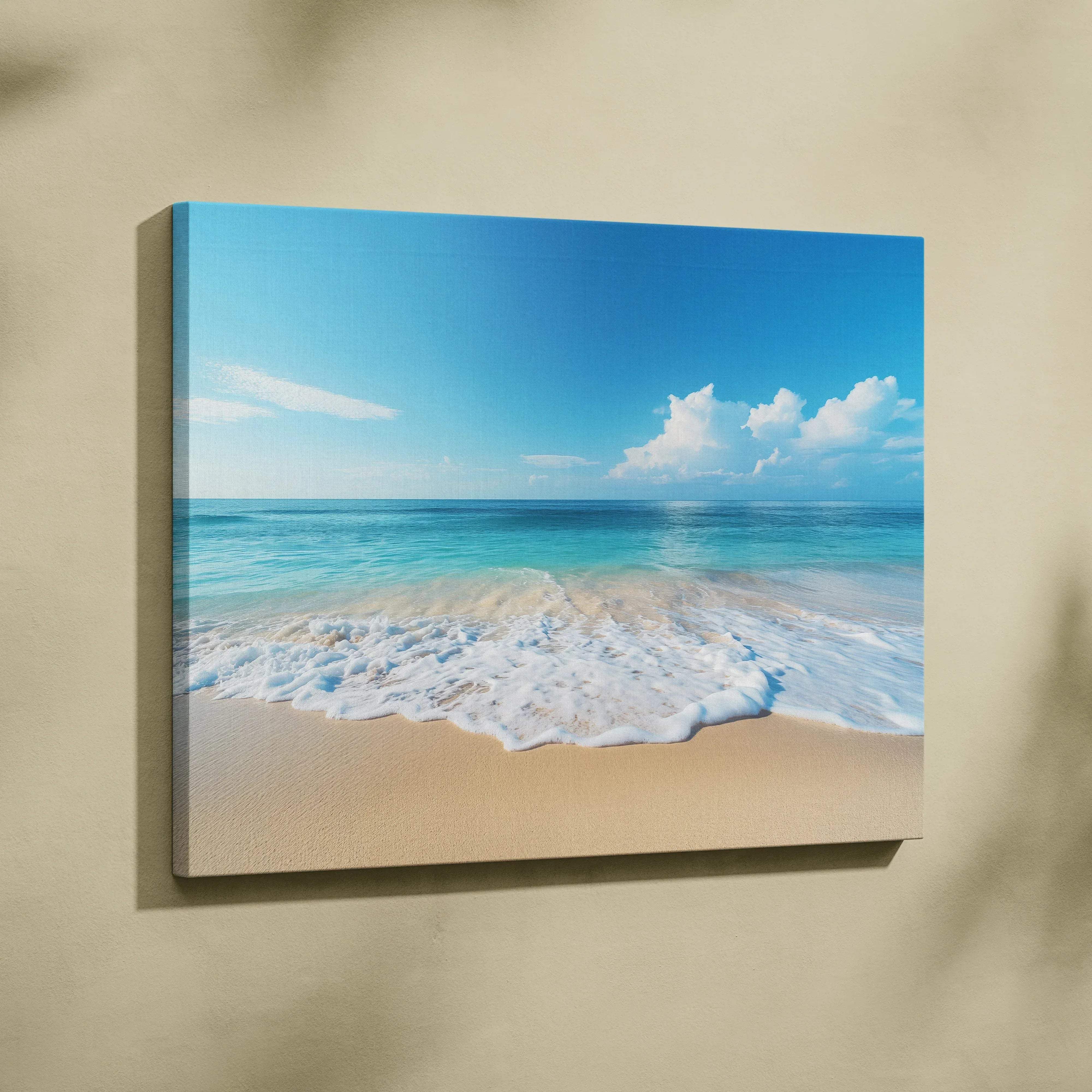 Calm beach scene canvas wall art featuring turquoise ocean white foam waves and sandy shore under bright blue sky