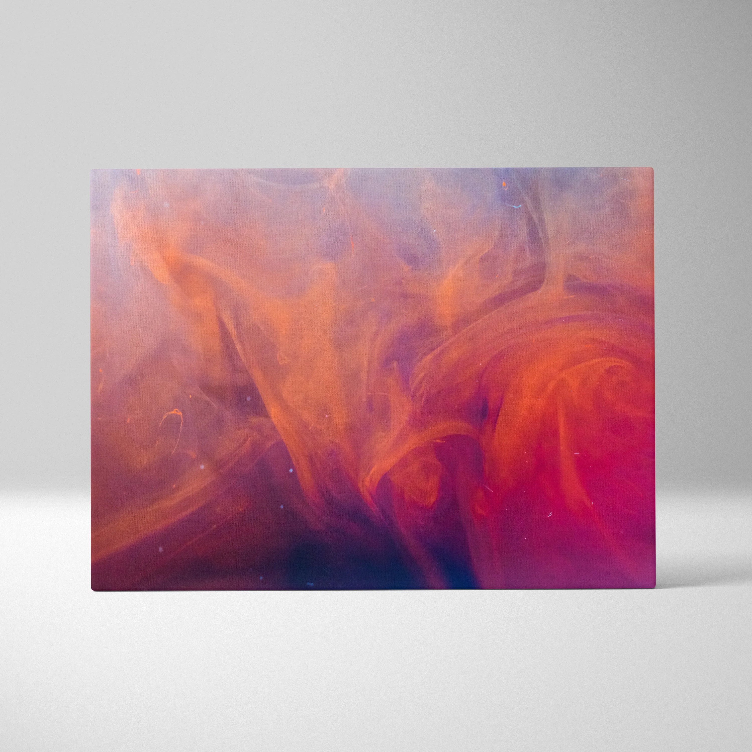 Abstract digital canvas art with swirling vibrant orange, pink, and purple hues blending dynamically.