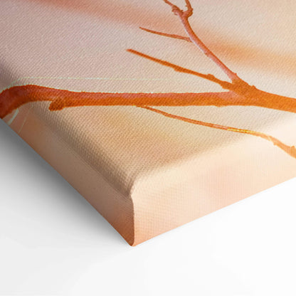 Canvas print of dreamy cherry blossom branches in warm sunset peach tones