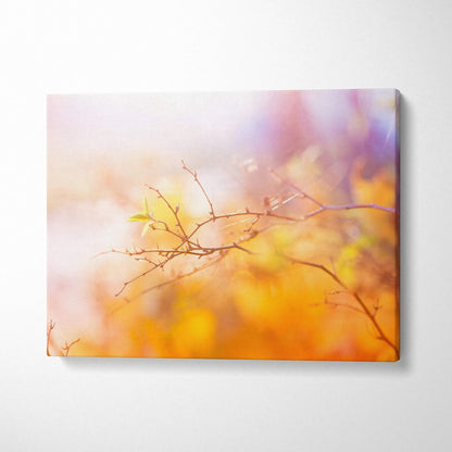 Canvas print of cherry blossom branches in warm sunset orange purple hues
