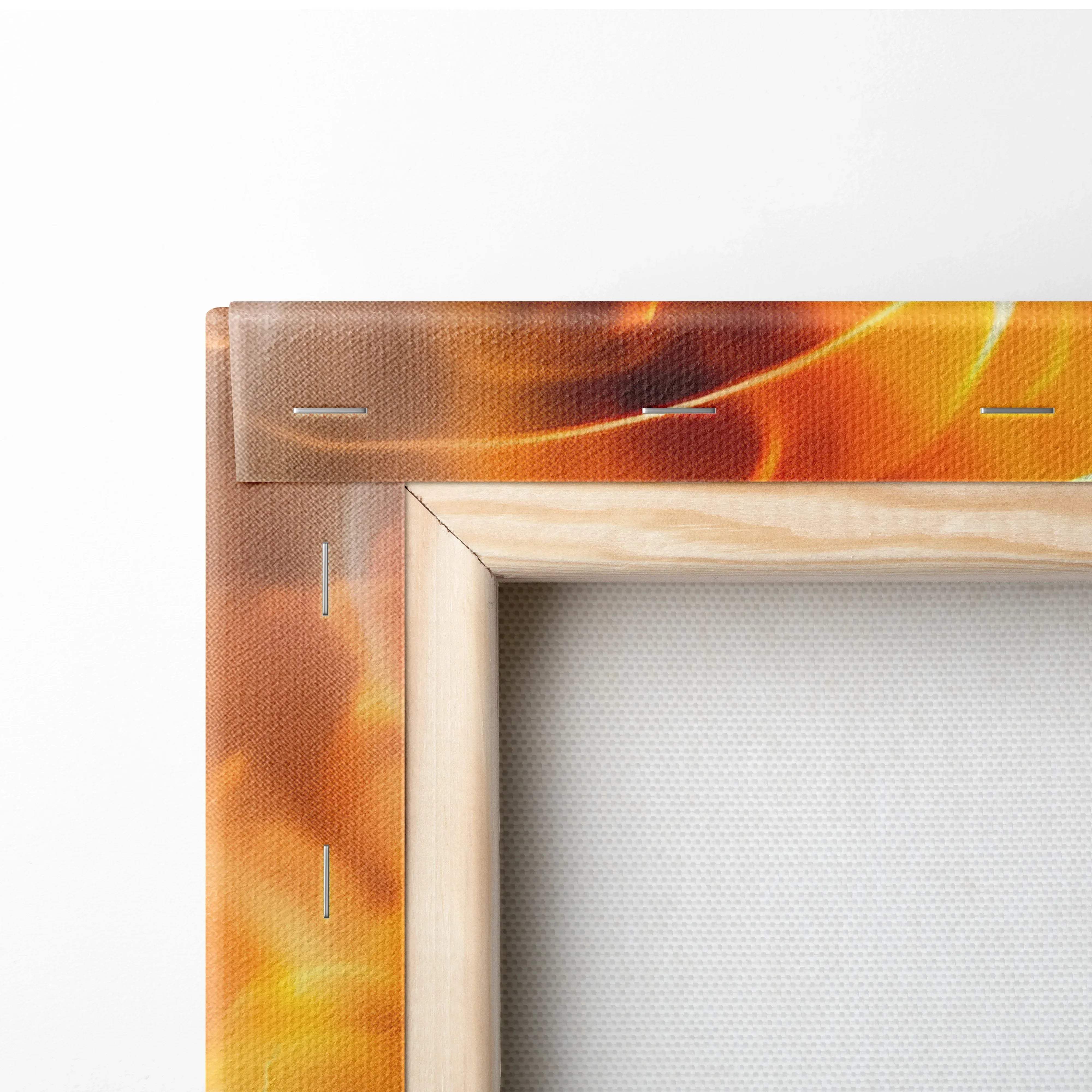 A canvas print featuring a vibrant orange and yellow flame design framed in light wood for modern wall art