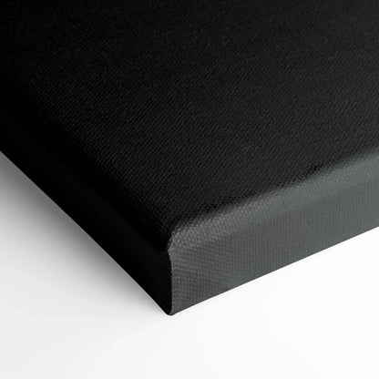 Black textured canvas stretched over wooden frame, corner detail of modern abstract wall art canvas print.