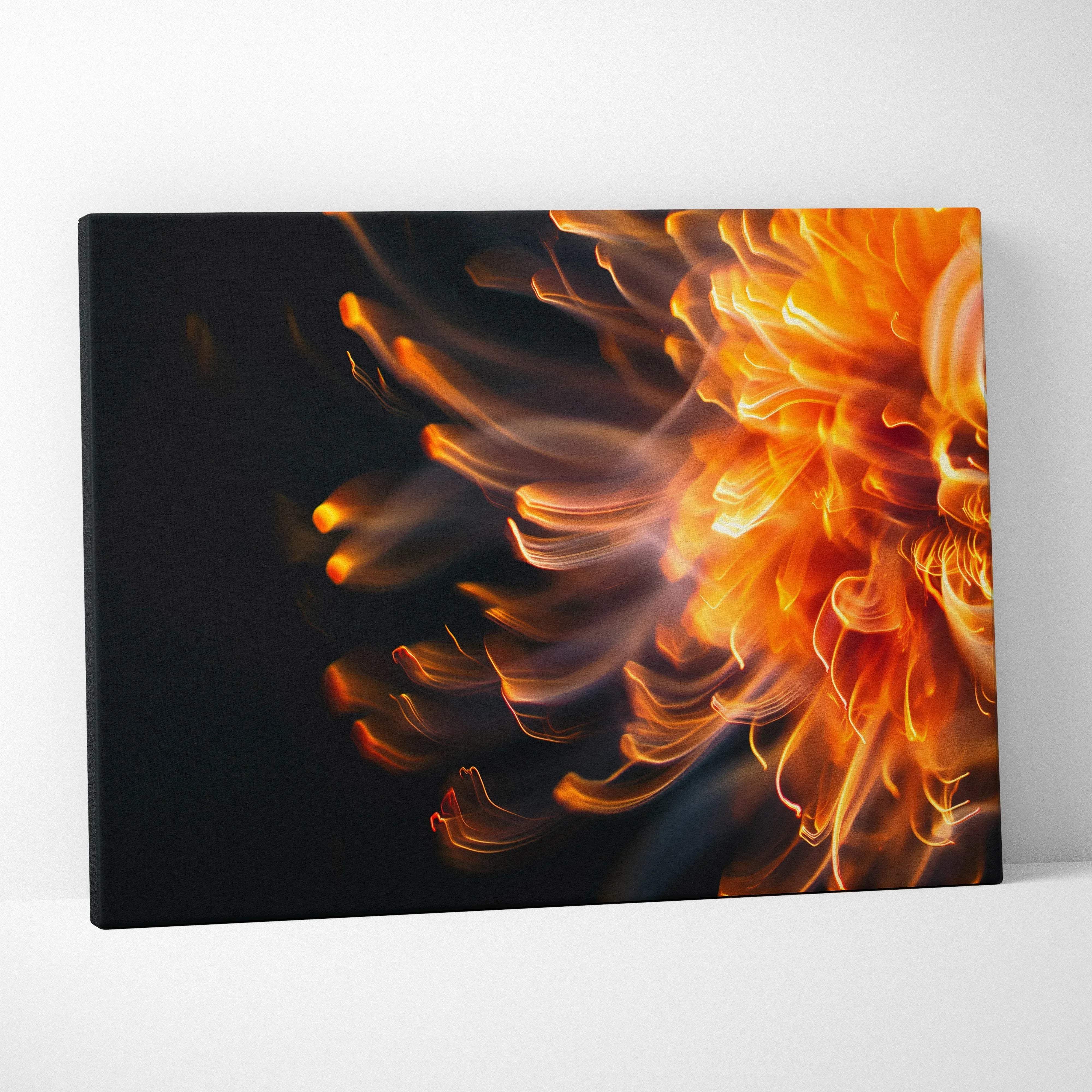 Fiery flame burst modern abstract canvas wall art with vibrant orange and yellow floral flames on a deep black background