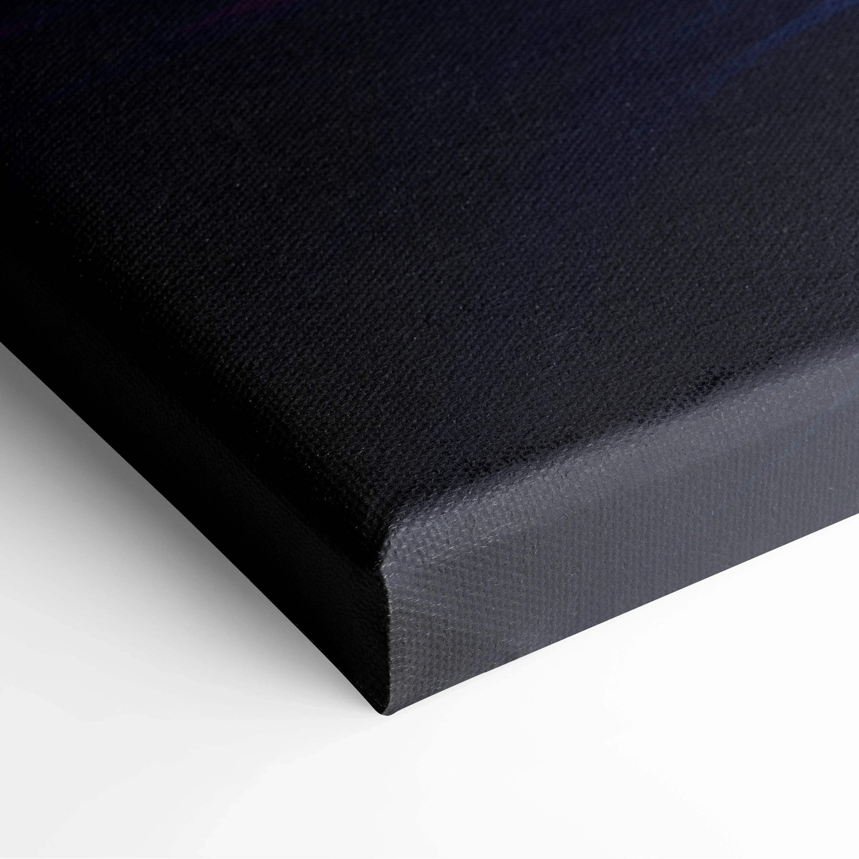 Close-up of black textured canvas corner with vibrant abstract digital art print wrapping around the edge.