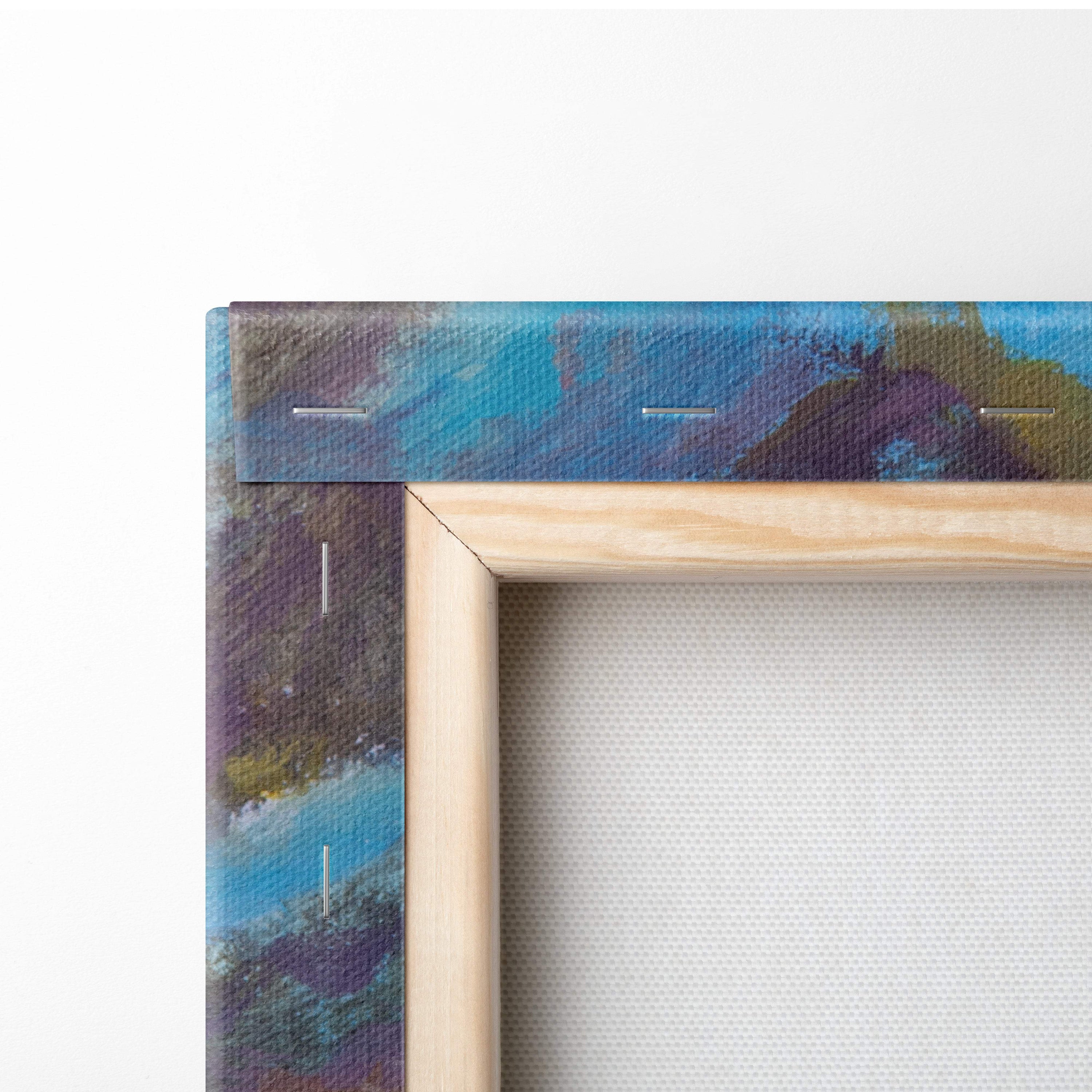 A wooden frame with light natural finish holds an abstract canvas painting of blended blue and purple shades vibrant wildflower meadow art