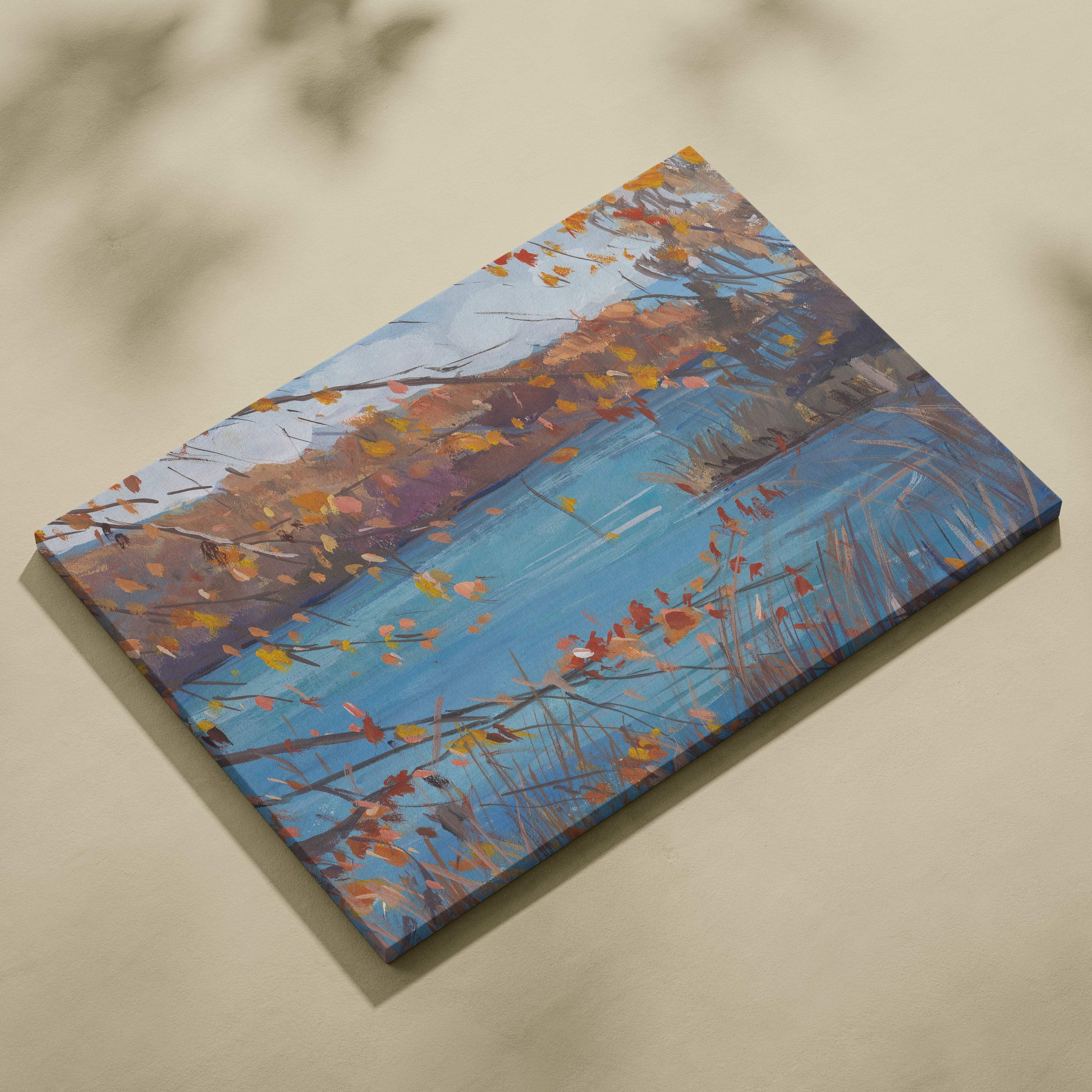 A rectangular autumn lake canvas print featuring vibrant orange and yellow leaves over a blue river in impressionist style