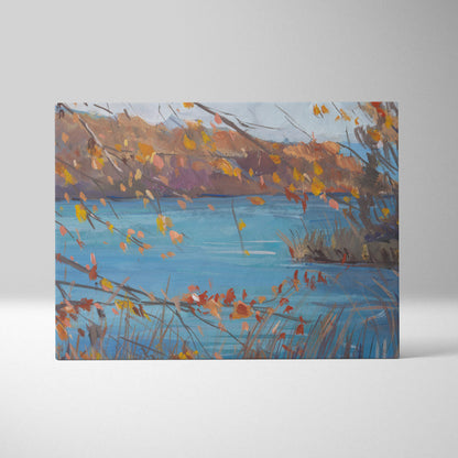 Autumn lake canvas print with vibrant orange and yellow leaves over serene blue water in impressionist style artwork