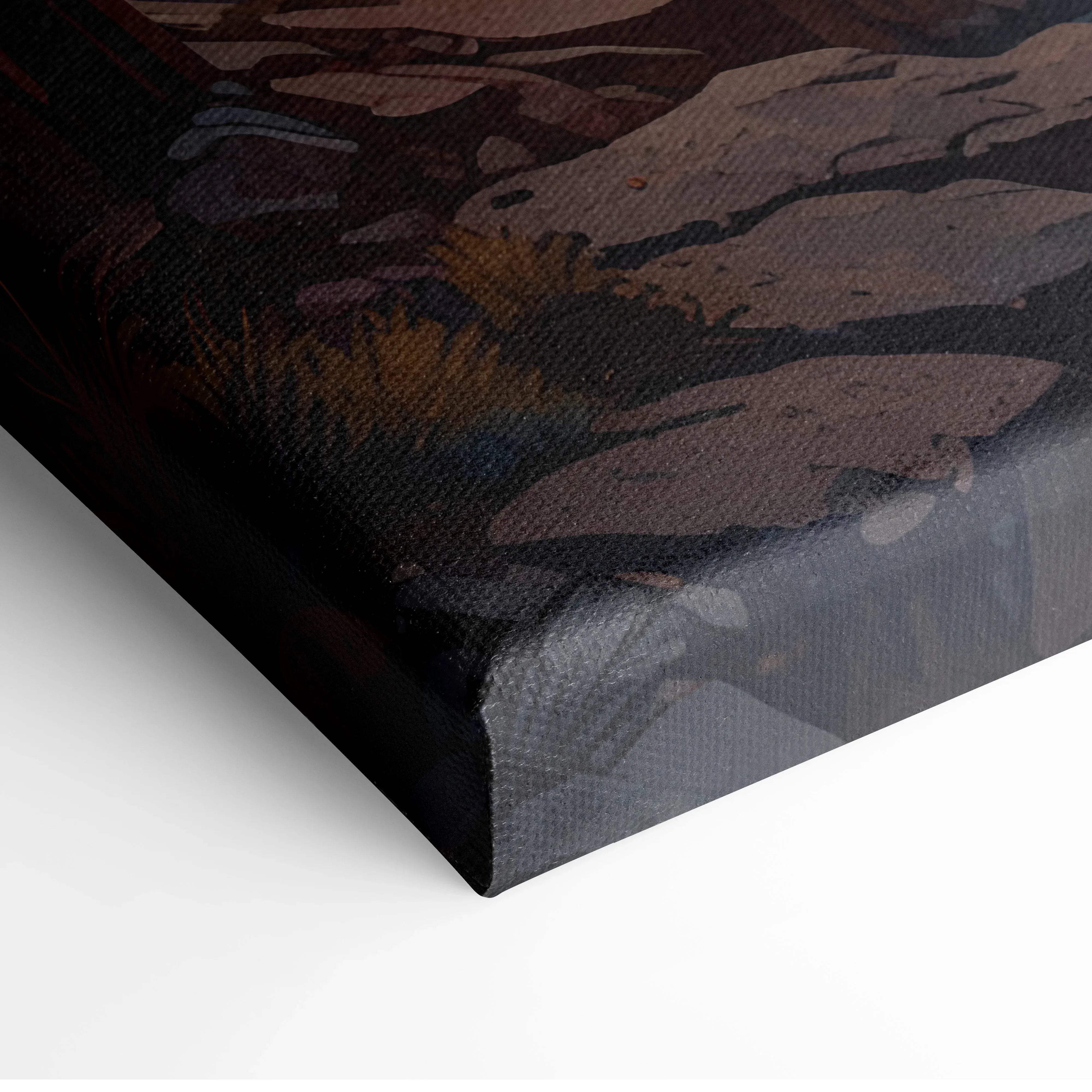 Black-framed canvas print of an impressionist canyon landscape with textured earthy tones and golden hour glow
