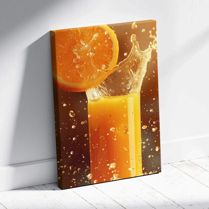 Canvas wall art featuring vibrant orange juice splash with a fresh orange slice on a warm background.