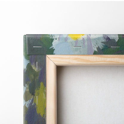 Light wood-framed white daisy canvas print with green blue and yellow abstract brushstrokes for spring garden decor