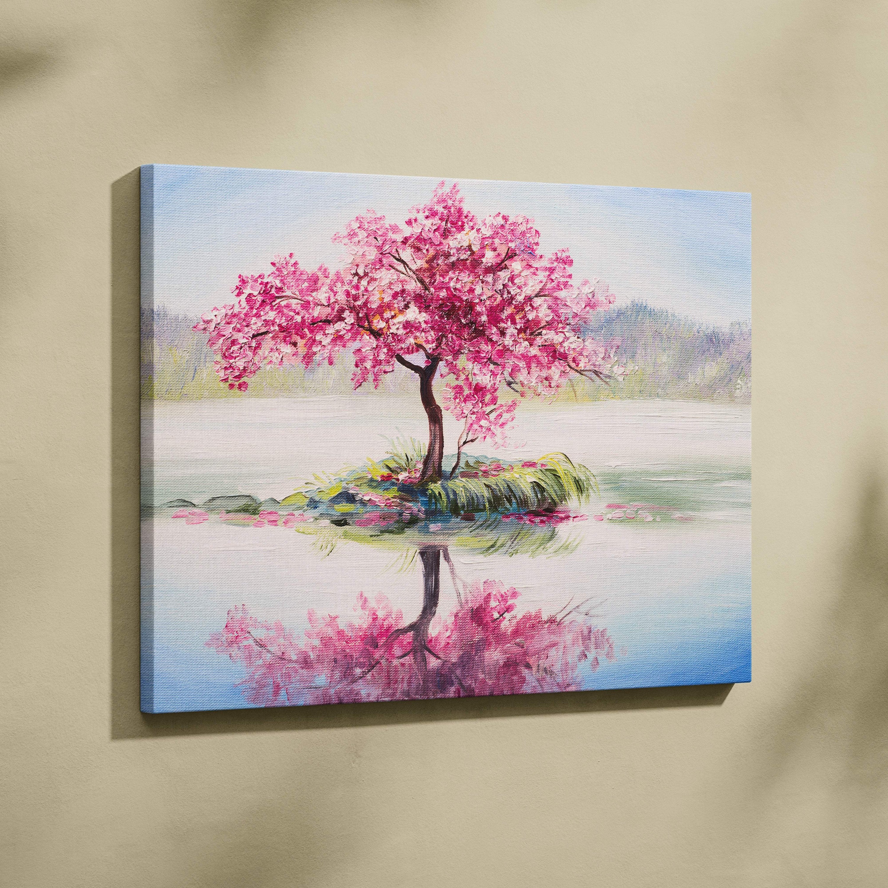 A vibrant pink cherry blossom tree painting on stretched canvas with soft brushstrokes and reflective lake beneath branches