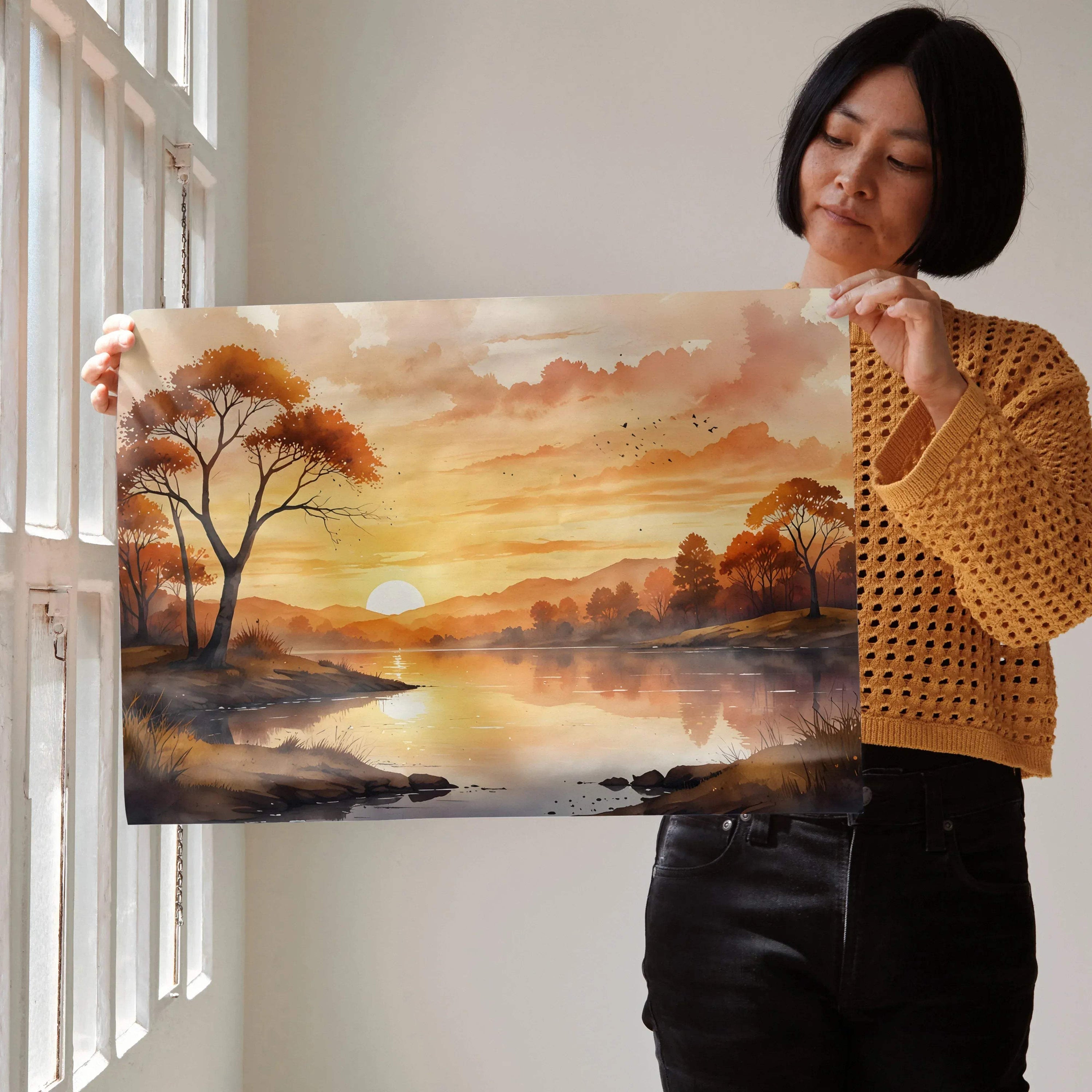 Watercolor sunset nature poster with warm orange and brown tones, trees, and reflective lake wall art.