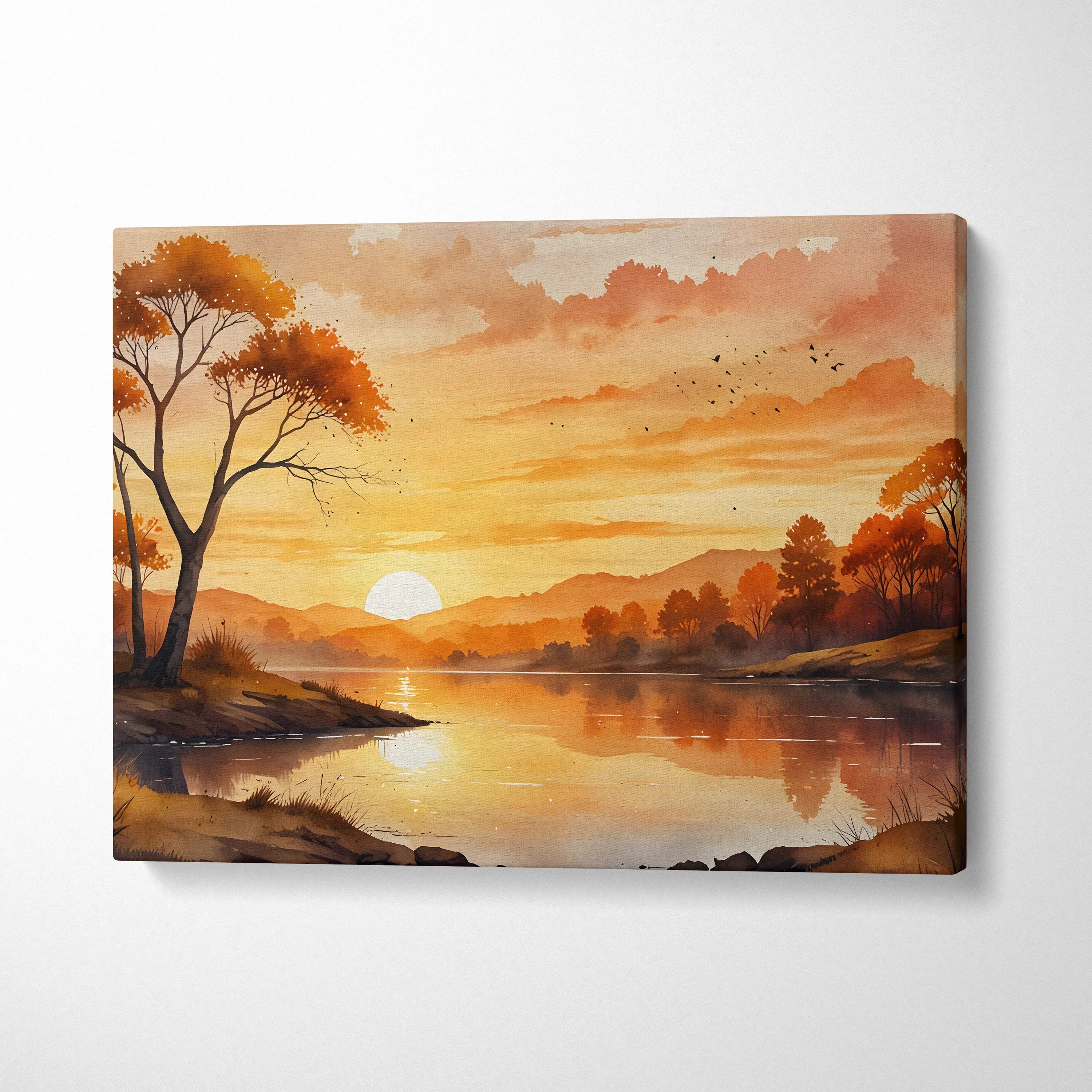 Serene golden hour sunset watercolor canvas wall art with warm orange and yellow tones and silhouetted trees.