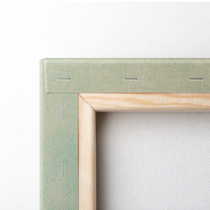 Light green canvas painting frame with natural wood border featuring surreal book stack reader digital illustration wall decor