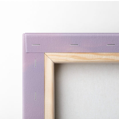 Lavender canvas painting with a light wood frame featuring pink cherry blossom tree and mountain sunrise wall art