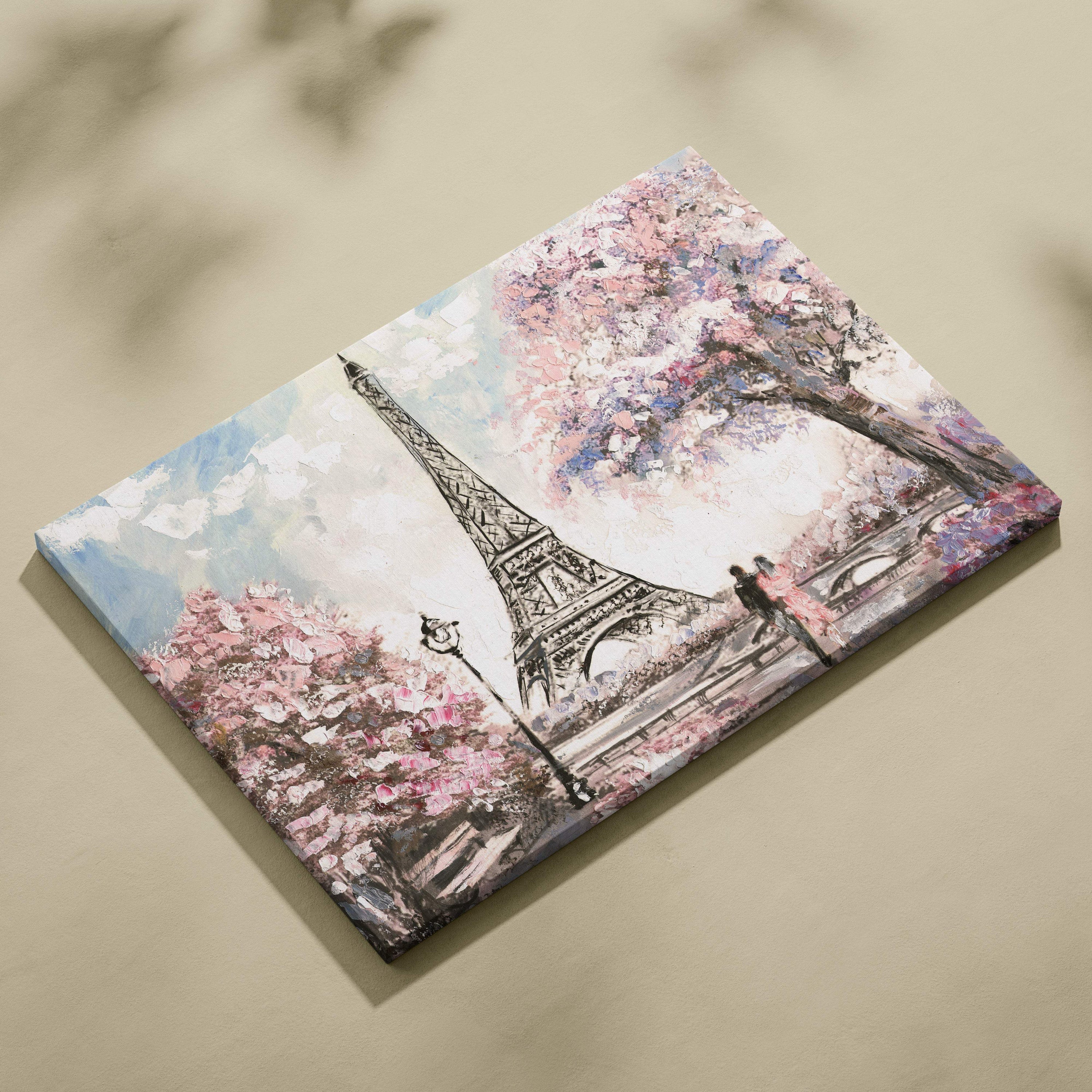Rectangular canvas print of the eiffel tower with pink cherry blossoms and a couple walking in soft pastel brushstrokes