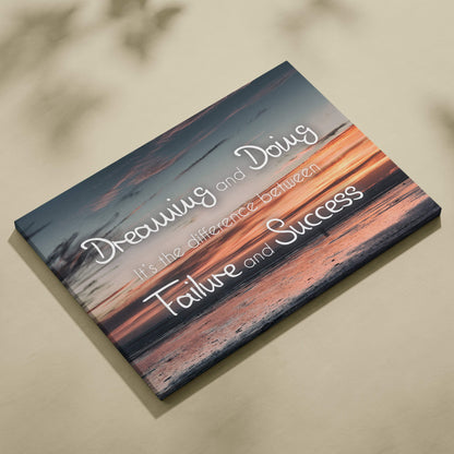 Rectangular canvas wall art with orange blue beach sunset and white cursive inspirational dreaming and doing quote