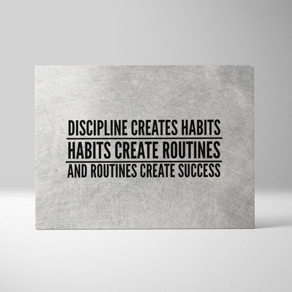 Gray textured canvas plaque with bold black motivational text about discipline creating habits routines and success for office gym or home