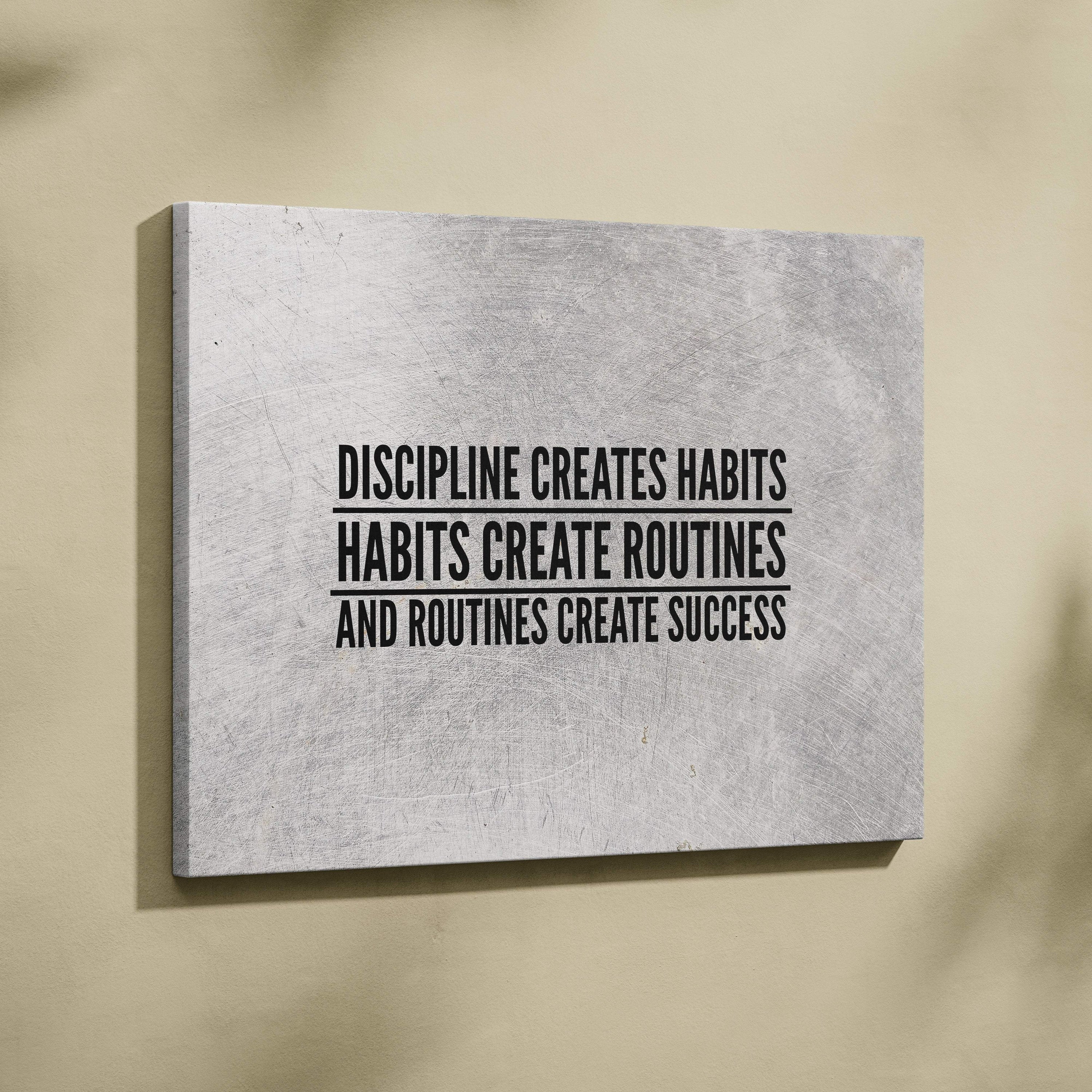 Gray textured canvas wall art with motivational discipline creates habits habits create routines success quote in black lettering