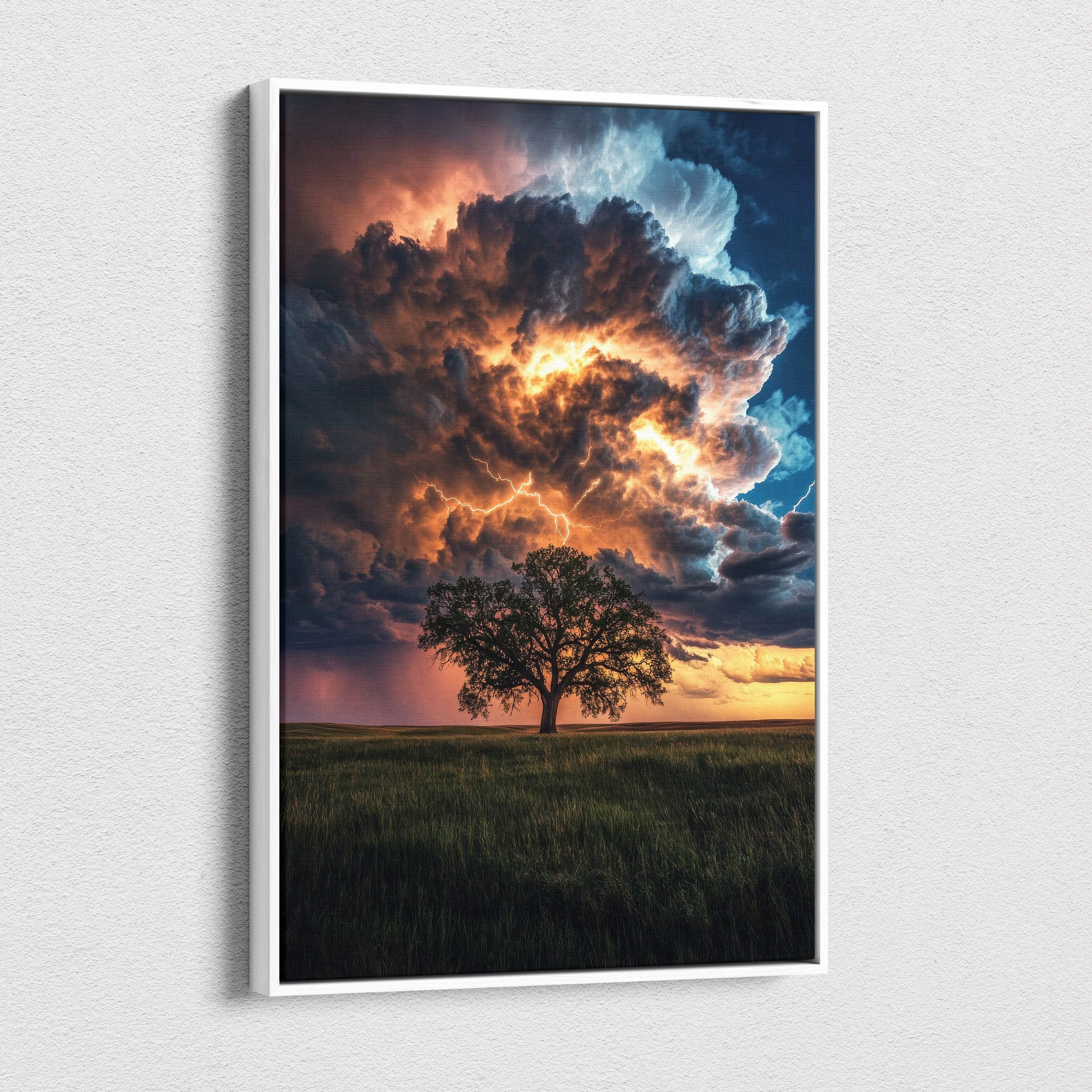 Framed canvas print of a lone tree under fiery orange and deep blue lightning storm clouds in an open field