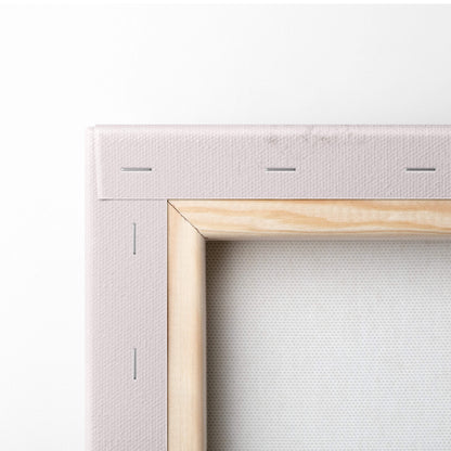 Contemporary flower book canvas wall art with light pink canvas and natural wood frame featuring subtle stitching edges