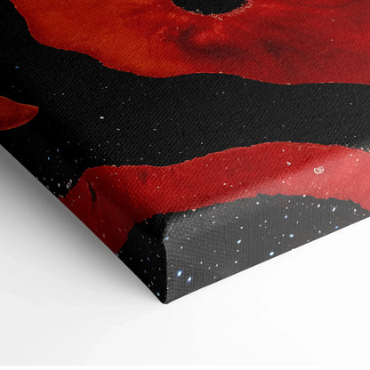 Abstract canvas wall art in red and black with textured brush strokes and speckled white accents.