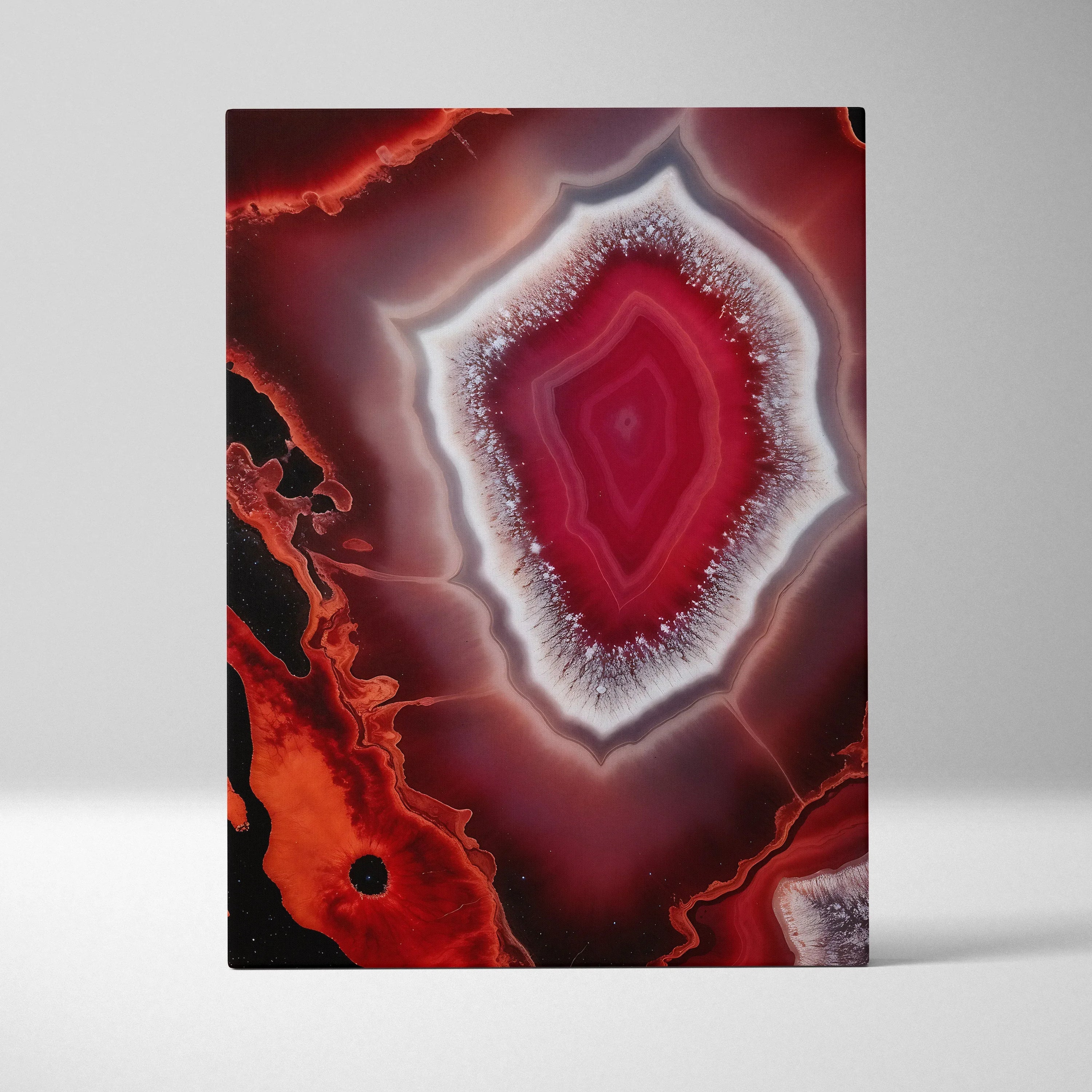 Vibrant red and black abstract canvas wall art with crystal-like central design and glowing edges.