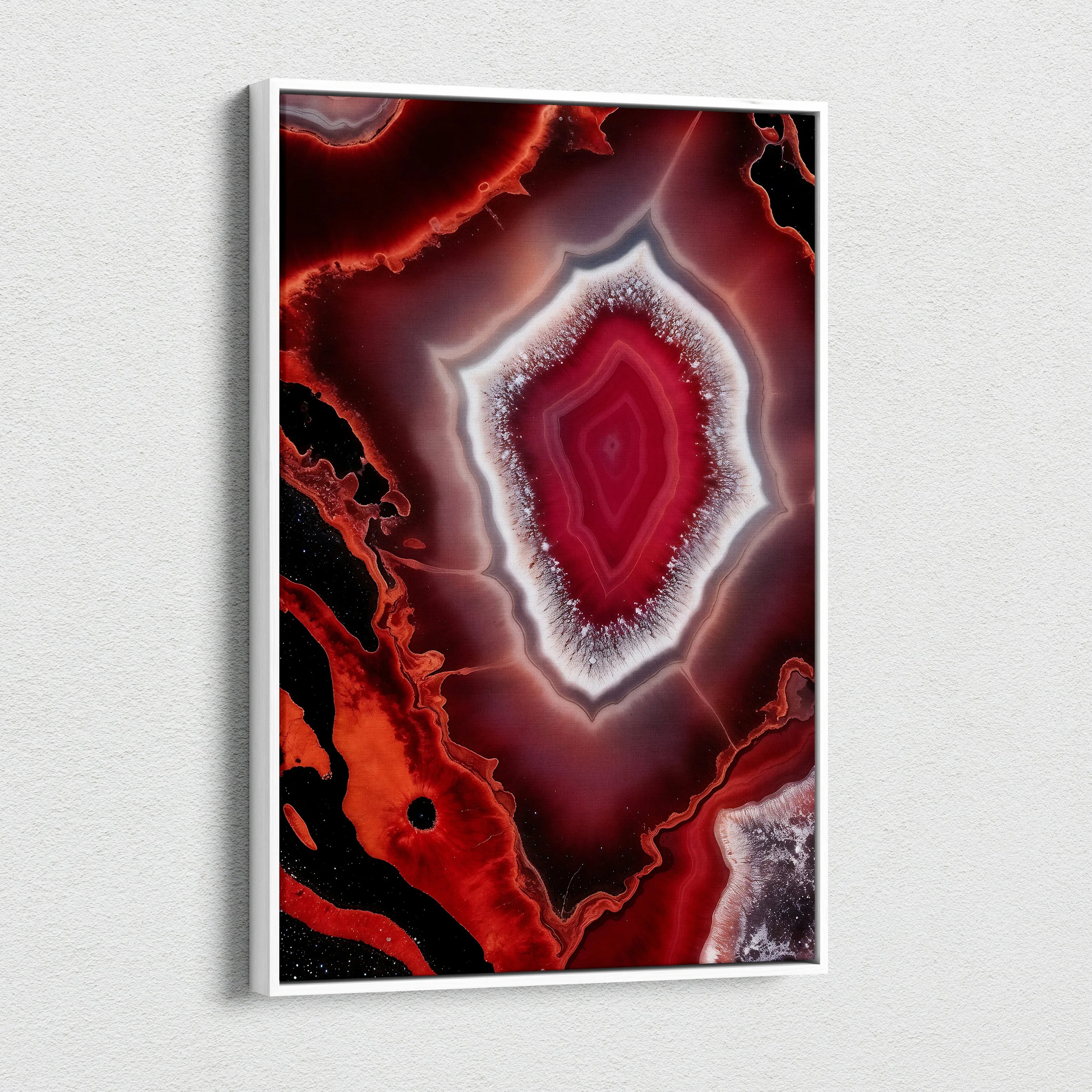 Vibrant red and black abstract geode pattern on vertical canvas wall art print.