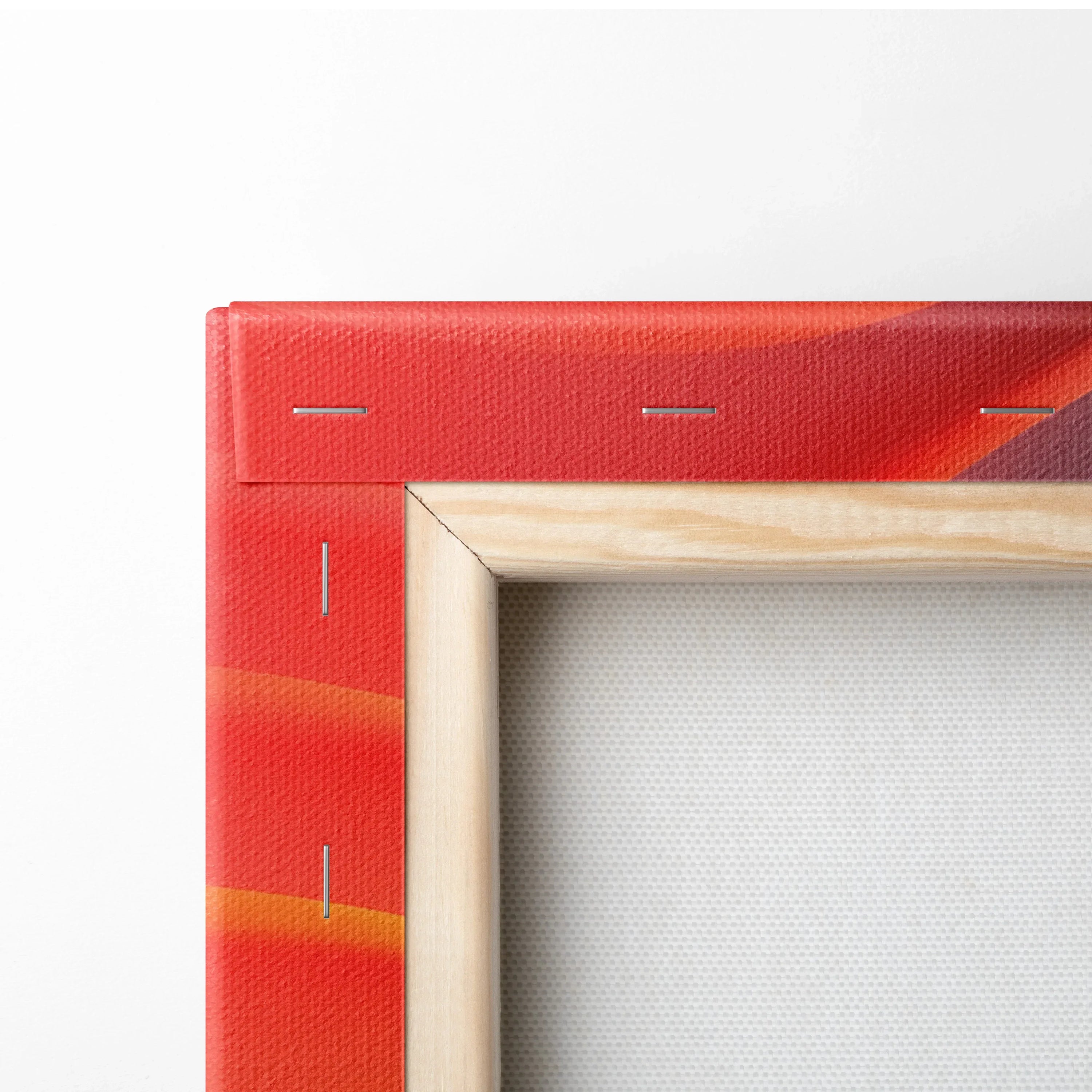 Close-up of colorful abstract digital canvas wall art with visible wood frame and secured staples.