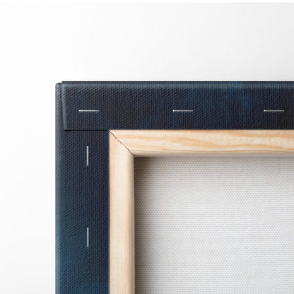 Dark navy canvas wrapped around a light wood frame stitched with white thread for massive thunderstorm tower product