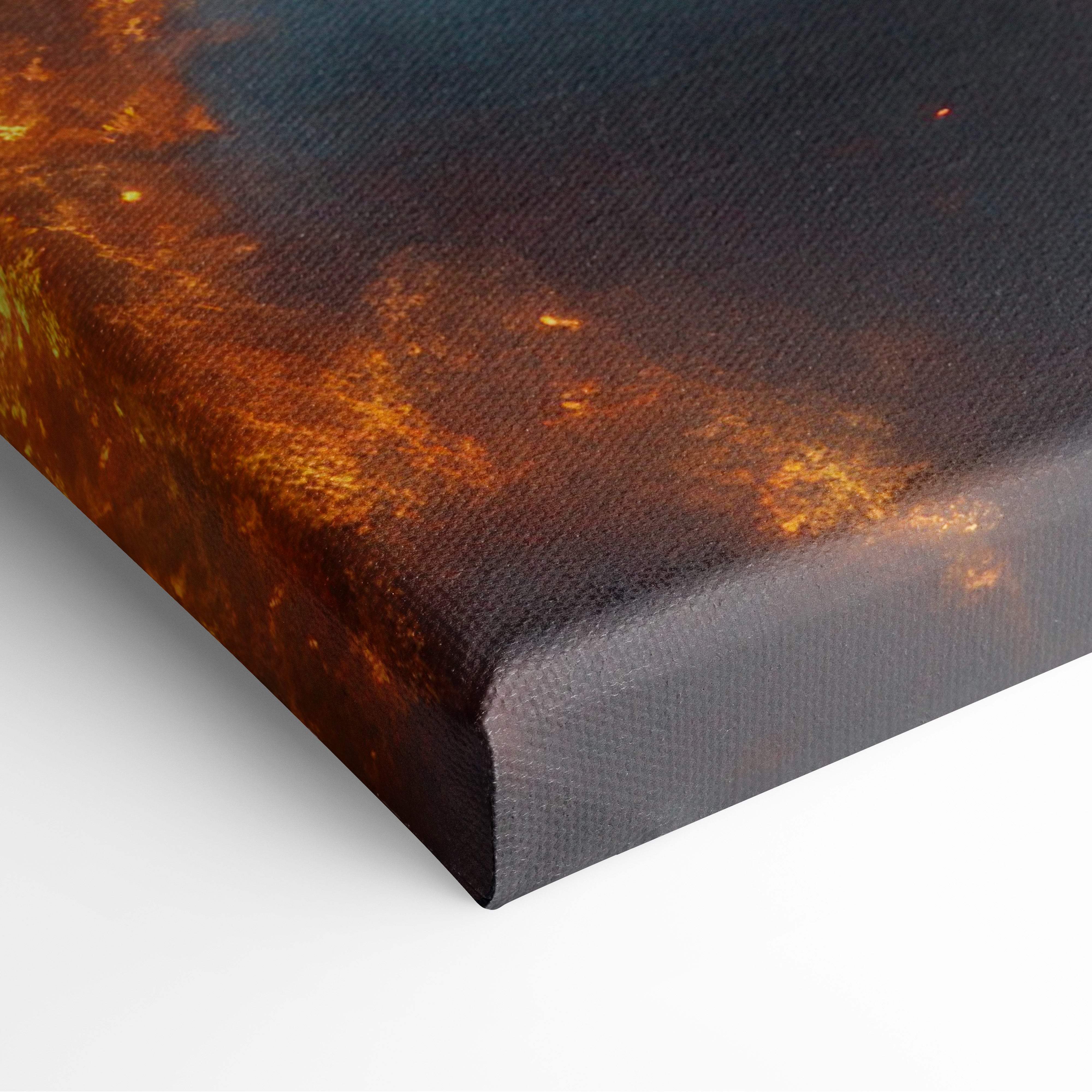 Canvas print of ethereal hooded spirit with swirling orange and deep blue nebulae in dark fantasy wall art
