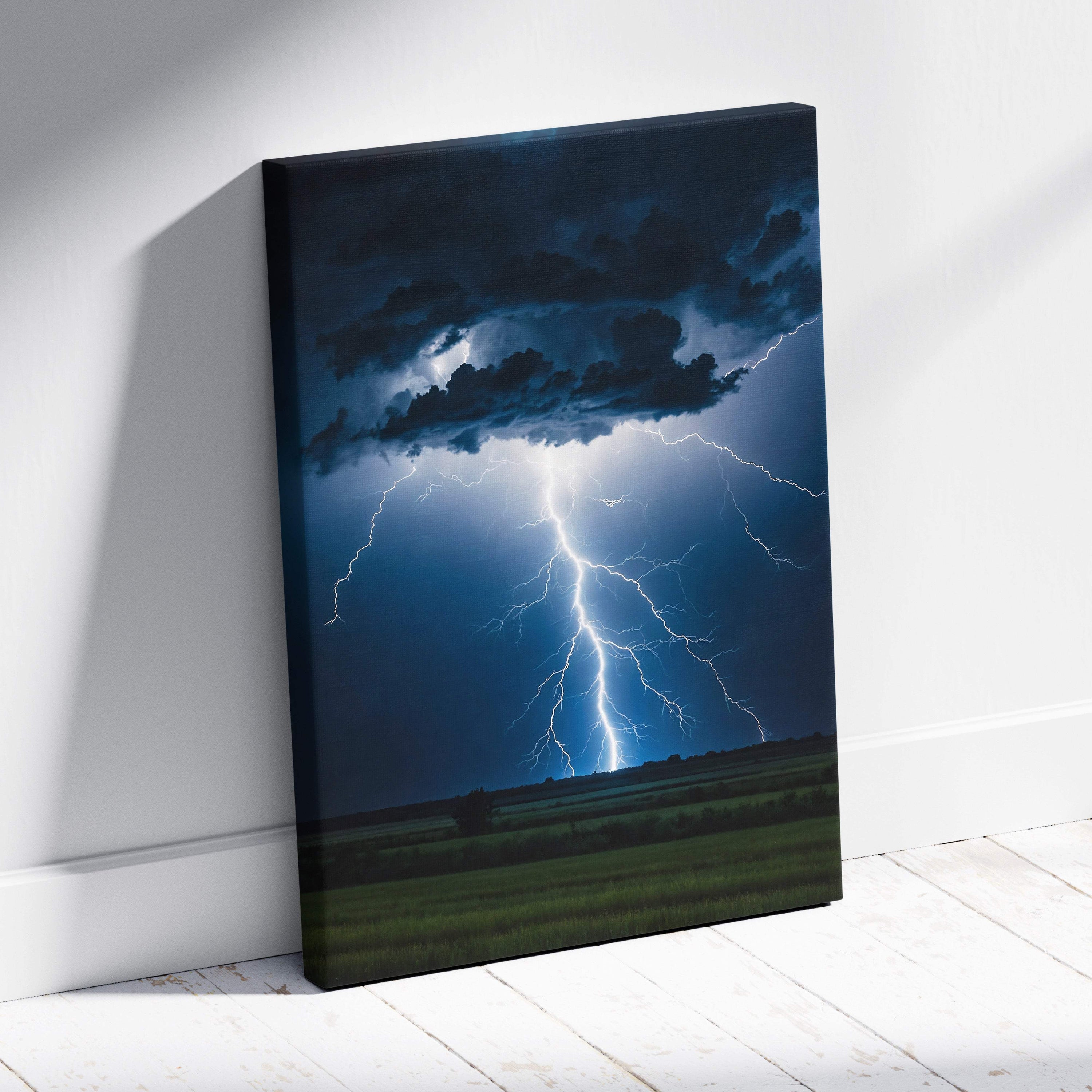 Canvas print of a powerful cloud-to-ground lightning strike with bright white bolts over deep blue skies and dark fields