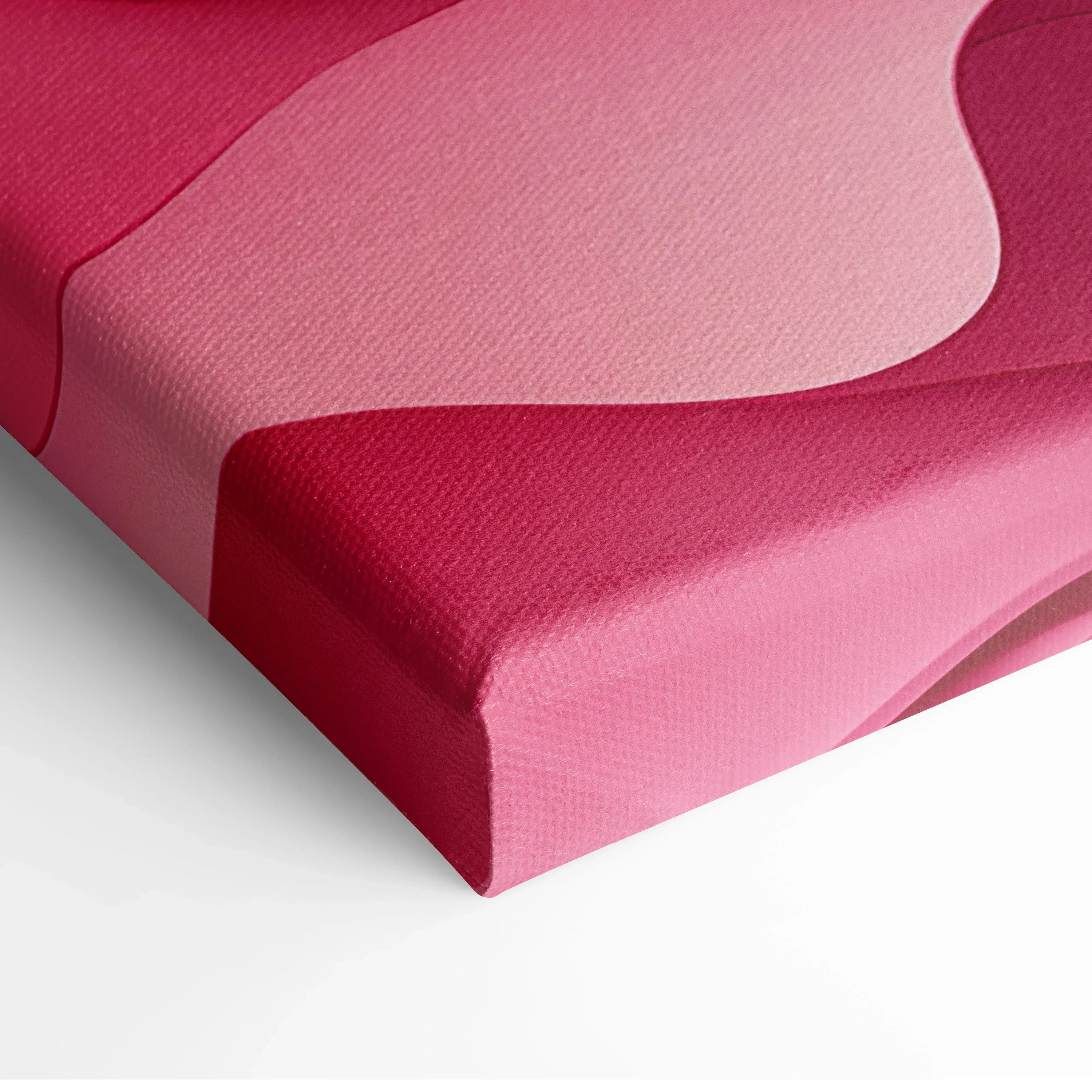 Abstract digital canvas wall art with bold pink and red curved shapes, vibrant modern décor.