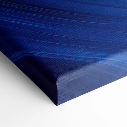 Deep blue abstract swirl canvas wall art print with textured brushstroke patterns for modern living room or coastal decor
