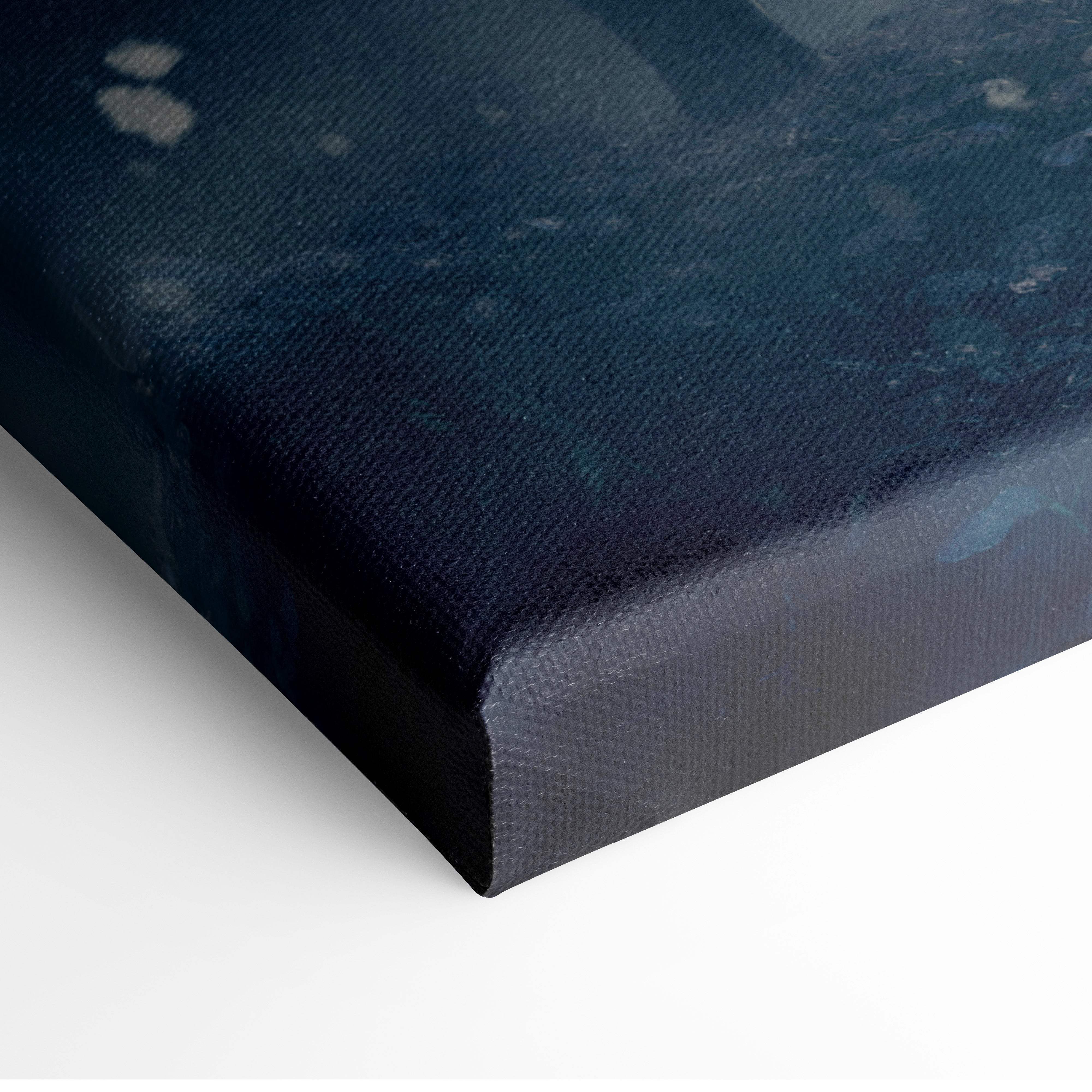Blue gray wolf canvas wall art in dark blue with textured surface and subtle white speckles for rustic cabin decor