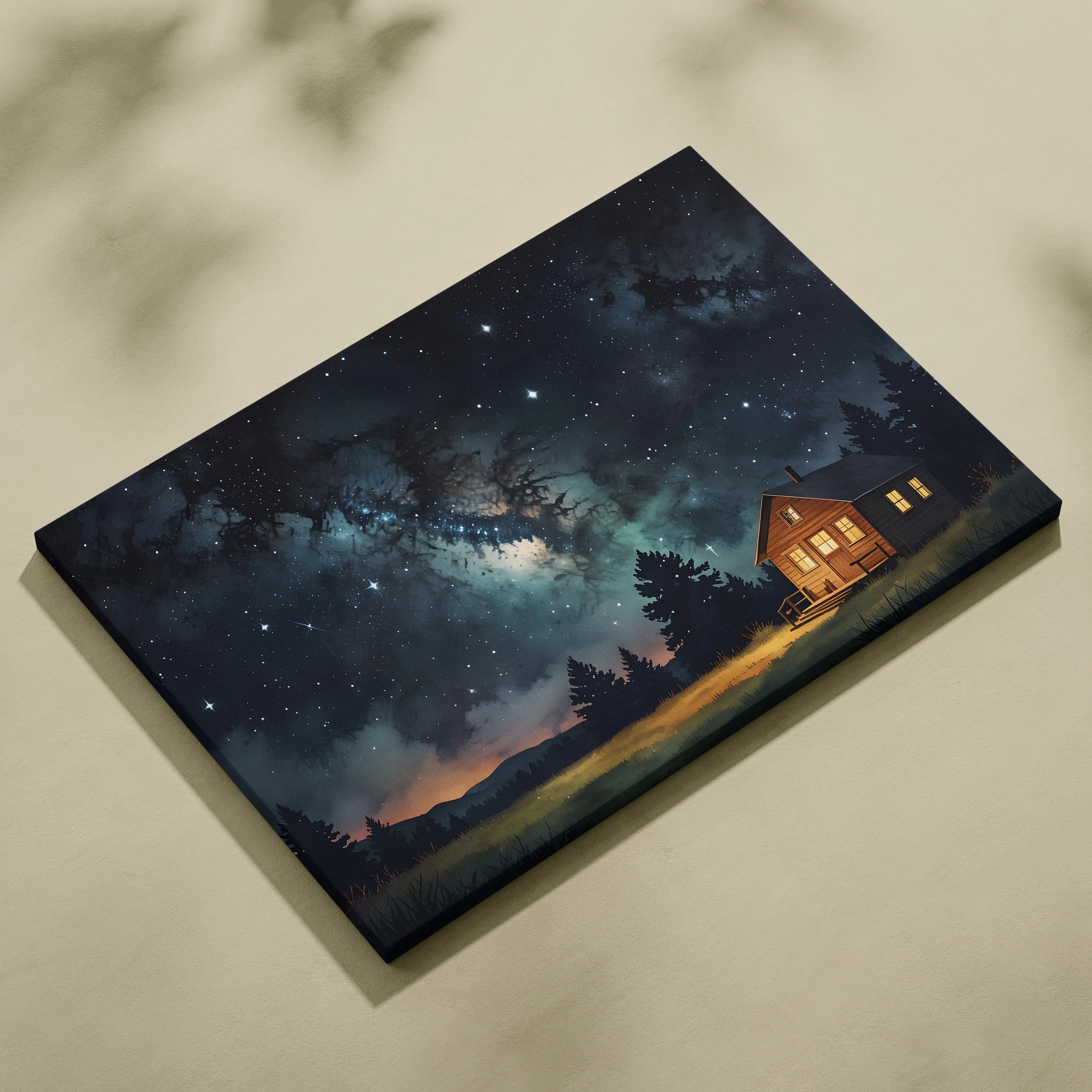Night sky canvas wall art featuring twinkling stars over a cabin and forest silhouette.