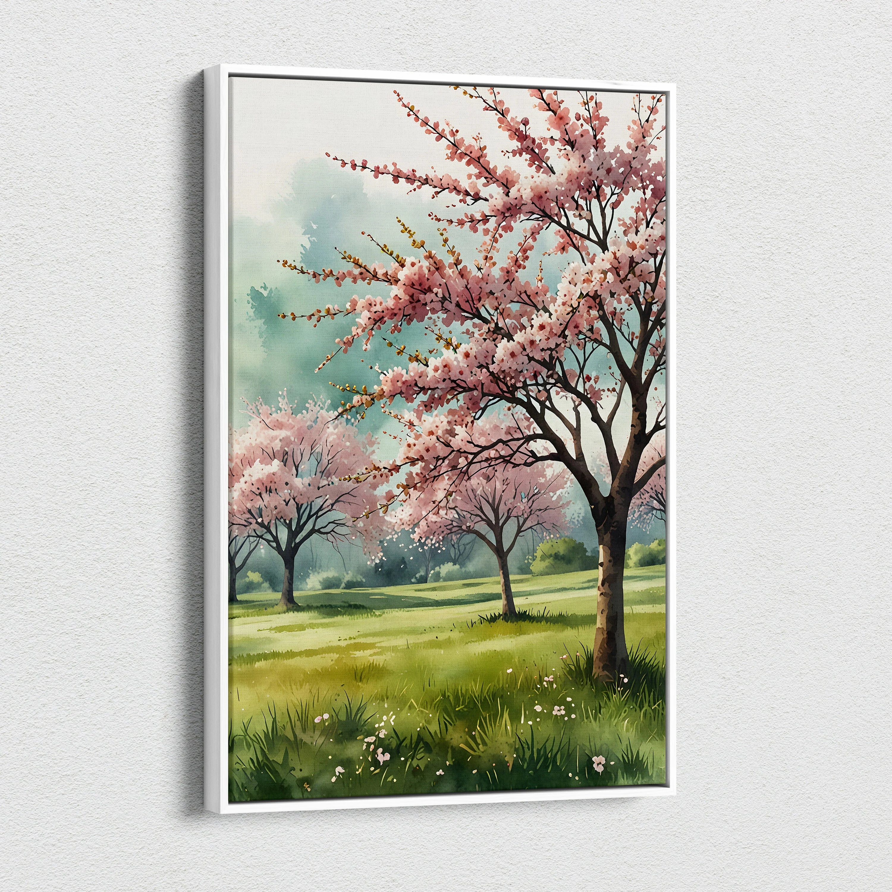 Cherry blossom watercolor canvas wall art featuring blooming pink trees over a green meadow.