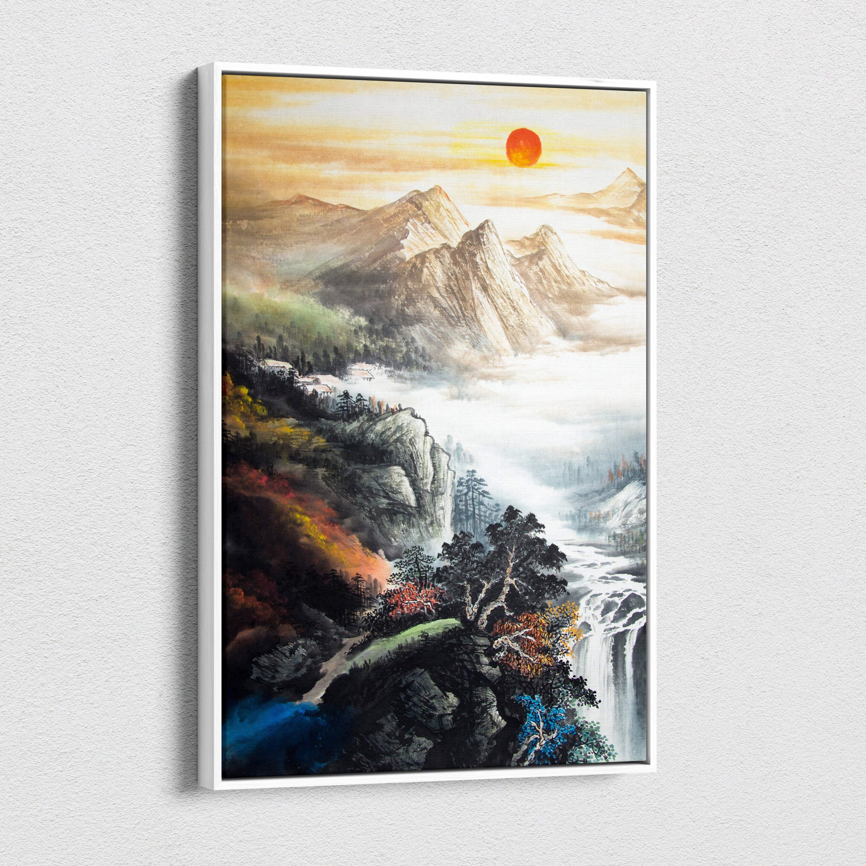 A framed asian mountain landscape canvas wall art featuring an orange sunrise waterfall in traditional ink painting style