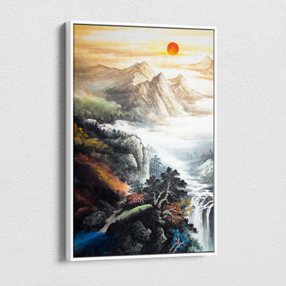 A framed asian mountain landscape canvas wall art featuring an orange sunrise waterfall in traditional ink painting style